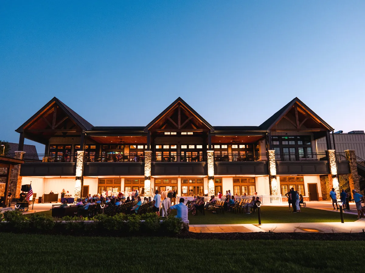 Clubhouse and amenities at a lakeside golf community